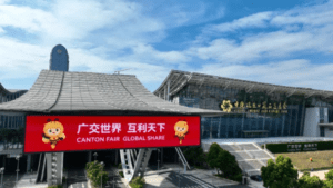 A striking red LED display at the entrance to the 135th Canton Fair announced 'Canton Fair Global Share', symbolising global trade expansion