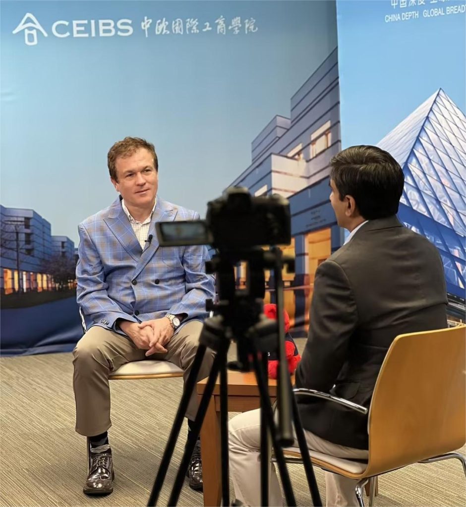 Carl Breau, CEO of Saimen, being interviewed at CEIBS event, discussing leadership and business strategies